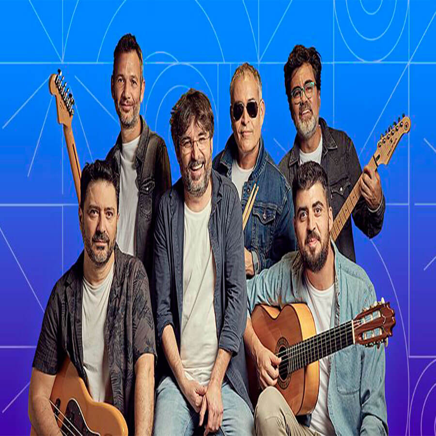 Grupo musical Évole y los niños Jesús.